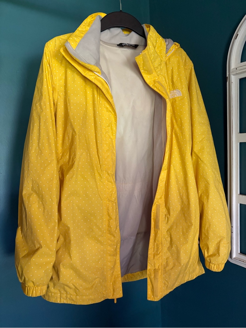 The North Face Women's Yellow Hooded Rain Jacket with Subtle Dot Print
